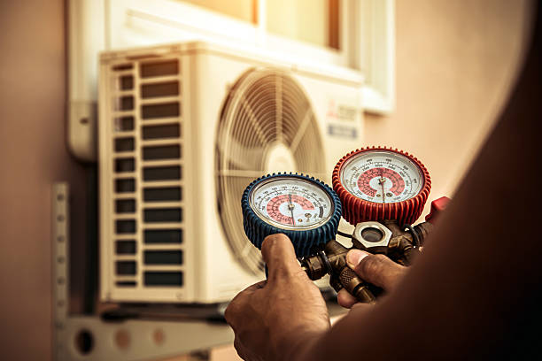 Professional Air Conditioning Service technician working in Bucyrus, KS